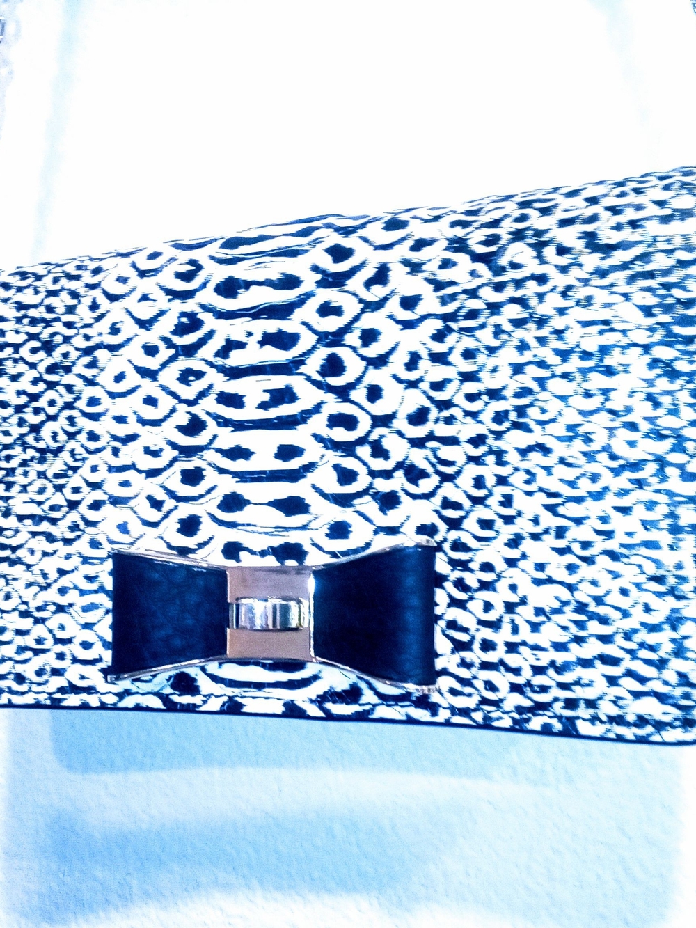 kate spade Black and White Printed Bow Clutch